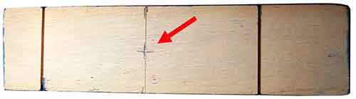 First mark centered between wheels
