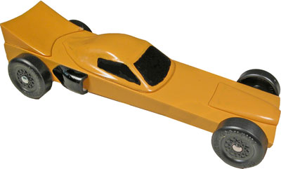 Extended wedge with plastic car parts.